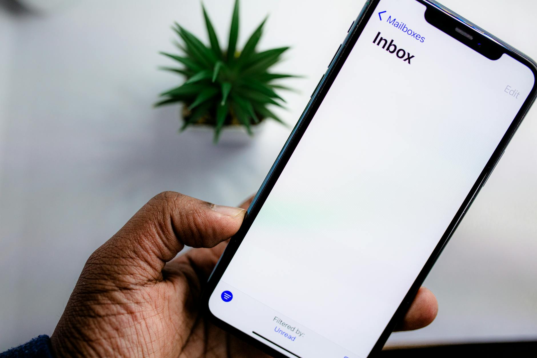 Person reading an email on their phone